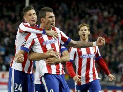 El croata Mario Mandzukic anotó tres goles para el triunfo del Atlético. EFE / J. Martín