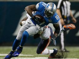 Johnson atrapó 11 pases para 146 yardas. AFP / G. Shamus