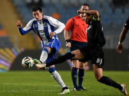 El volante mexicano Héctor Herrera (izq.) sigue levantando su nivel en Europa. AFP / F. Leong
