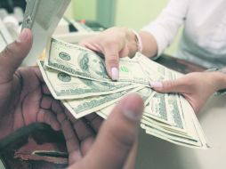 Fricción cambiaria. La subasta de dólares va a servir 'para disminuir las presiones y que no se deprecie tanto el peso. EL INFORMADOR / A. Camacho