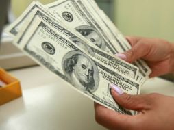 En la categoría interbancaria, el peso permaneció estable a 14.71 unidades por dólar. EL INFORMADOR / ARCHIVO