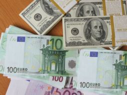 El tipo de cambio para solventar obligaciones en moneda extranjera es de 14.7499 pesos, informa Banxico. AFP / ARCHIVO