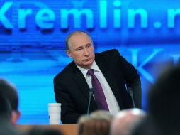 Vladimir Putin durante la rueda de prensa anual para medio nacionales y extranjeros. AP / M. Klimentyev