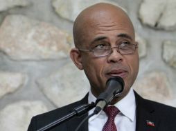 Martelly busca soluciones al estancamiento que afecta al gobierno por el atraso de elecciones legislativas desde 2011. AP / ARCHIVO