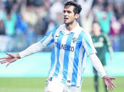 A cerrar. El delantero guaraní ya se encuentra en nuestro país y llegó acompañado de Agustín Manzo. AP /