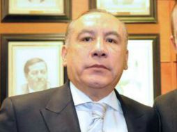 El escándalo se desató luego de que el oaxaqueño pidiera a su hijo cuidar del presunto regalo navideño. FACEBOOK / Heliodoro Carlos Diaz Escarraga