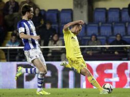 El gol fue obra del ruso Denis Cheryshev (d) al minuto 71. EFE / D. Castelló