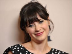 La actriz y cantantante de ''She and Him'' espera el fruto de su relación sentimental con el director Jacob Pechenik. AP / J. Shearer