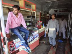 Gente de Somalia, Etiopía o Pakistán dirige buena parte de los puntos de comercio que operan en los 'townships'. EFE / K. Sutherland