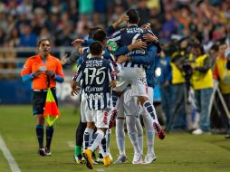 Jugadores del Pachuca celebran una anotación. MEXSPORT / R. Maya