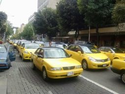 Los taxistas junto con sus vehículos se retiraron del Centro de Guadalajara cerca da las 16:00 horas. EL INFORMADOR / E. Barrera