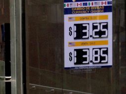 El tipo de cambio para solventar obligaciones en moneda extranjera pagaderas en la República es de 14.6878 pesos. NTX / ARCHIVO