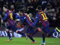 Messi festeja el gol que le dio el triunfo definitivo al Barcelona. AP / M. Fernandez