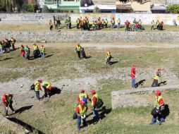 Participantes en el programa de empleo temporal laboran en la Colonia San José Río Verde, en Guadalajara. EL INFORMADOR / M. Vargas