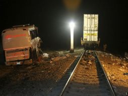 Personal Forense trabaja en el sitio del accidente de un autobús en Anáhuac, Nuevo León. AP /