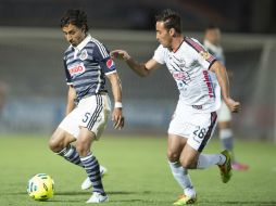 El enfrentamiento ante Lobos BUAP marcó el regreso de Arce (i) al torneo de Clausura 2015 de la Copa MX. MEXSPORT / ARCHIVO