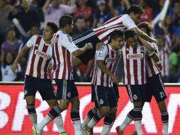 El equipo Rojiblanco arriba motivado por un triunfo que les dio respiro en la liga. AFP / ARCHIVO