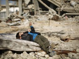 La ONU incumple promesa de apoyar con cinco mil 400 millones de dólares para reconstruir las ciudades. AFP / M. Abed