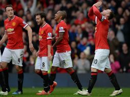 Los Red Devils tienen la última plaza que califica a la Liga de Campeones. AFP / O. Scarff