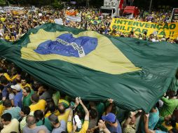 Cifras policiales dijeron que 1.8 millones de personas salieron a las calles de todo el país. AP / A. Penner