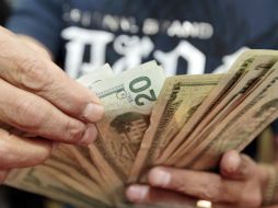 El peso ha perdido más de un 15% de su valor frente al dólar en los últimos seis meses por el mismo motivo. EL INFORMADOR / ARCHIVO