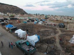 En febrero pasado, oficiales de Tlaquepaque y de la Fiscalía montaron una movilización para desalojar a casi 500 invasores. EL INFORMADOR / ARCHIVO