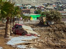 El atípico temporal en la zona desértica del norte de Chile ha causado hasta ahora la muerte de 23 personas. AFP / P. Miranda