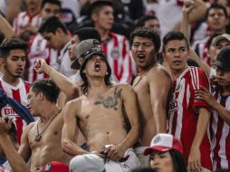 Las porras de Atlas y Chivas salieron del estadio en distintos momentos parea evitar enfrentamientos. EL INFORMADOR / F. Atilano