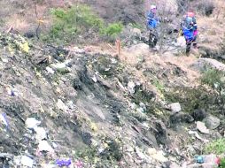 Tragedia. Aspecto del rescate de cuerpos tras el accidente en Los Alpes. AFP /