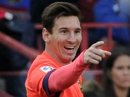 Messi cree que el Barsa aprovecha bien a sus compañeros, Neymar y Luis Suárez. AFP / ARCHIVO