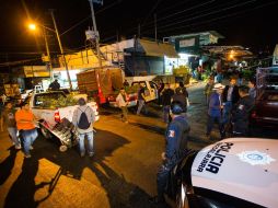 Los operativos se realizan de madrugada, cuando los productores llegan para ofrecer su mercancía. EL INFORMADOR / P. Franco