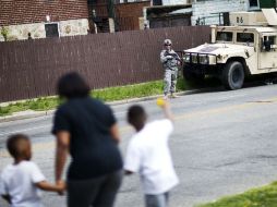 La violencia que ha llevado a las autoridades locales y a la Guardia Nacional a decretar toque de queda comenzó el pasado lunes. AP / D. Goldman