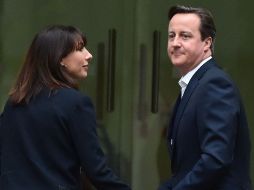 Con la victoria del partido Conservador, se garantiza el regreso del primer ministro David Cameron a Dowing Street. AFP / L. Neal