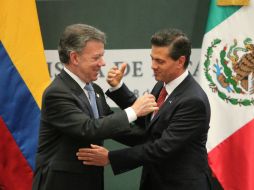 Los mandatarios se reúnen tras visita de Santos en el país. SUN / L. Godínez