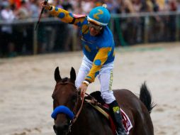 El binomio corre 1.9 kilómetros en un minuto, 58 segundos y 46 décimas. AFP / R. Carr