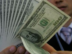 El Banxico fijó el tipo de cambio para solventar obligaciones en 15.1200 pesos. EL INFORMADOR / ARCHIVO