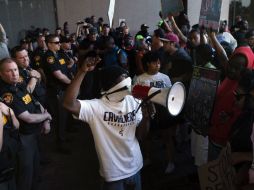 Pese a que las marchas se ha registrado de forma pacífica, medios locales señalan que hay tres personas detenidas. AP / J. Minchillo