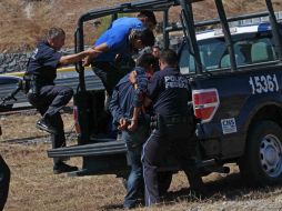 En el interior de dos camionetas pick up, los elementos localizan un total de dos millones 846 mil 410 dólares. SUN / ARCHIVO