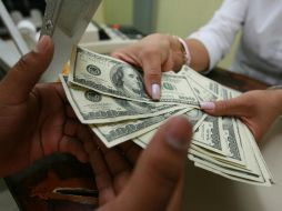 Banco Base prevé que durante la sesión el tipo de cambio se cotice entre 15.30 y 15.45 pesos por dólar. EL INFORMADOR / ARCHIVO