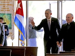 Durante su estancia en la Ermita de la Caridad, Obama fue acompañado por el padre Juan Rumín Domínguez. AP / A. Díaz