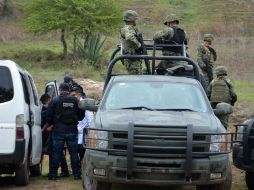 Peritos en criminalística y ministerio público de la Fiscalía acudieron al lugar de los hechos para realizar el levantamiento. EFE / J. de la Cruz