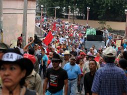 Desde la semana pasada se han realizado movilizaciones en una decena de ciudades hondureñas para exigir la renuncia del mandatario. AFP / O. Sierra