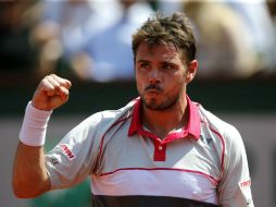 El suizo de 30 años, que el año pasado cayó en París en primera ronda, se antepuso al calor de la pista central. EFE / I. Langsdon