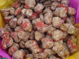 El nuégado está hecho a base de harina, azúcar, polvo para hornear, agua, huevos, una pizca de sal, carmín y manteca. ESPECIAL / conchiapas.com