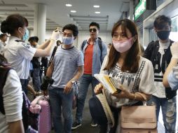 La OMS sostiene que el contagio del virus no es fácil y requiere un contacto muy directo. AP / ARCHIVO