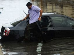 La tormenta tropical ''Carlos'' ya ha comenzado a dejar sus primeros estragos en ciudades como Acapulco, Guerrero. AFP / P. Pardo