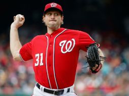 Con 82 de sus 106 lanzamientos para strikes, el lanzador de 30 años de edad corrobora su excelente estado. AFP / R. Carr