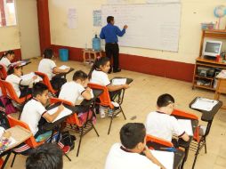 Los docentes volvieron a clases el miércoles de la semana pasada, cumpliendo la condición de la Segob para reanudar el diálogo. SUN /  E. Hernández