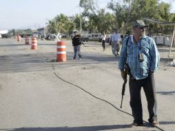 Calderón dijo que en el lugar, criminales negocian con funcionarios. AP / ARCHIVO