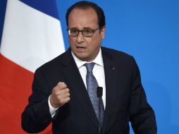 Hollande legalizó discretamente estas prácticas a través de la nueva y controvertida ley de espionaje francés, aprobada el 24 de junio. AFP / P. Desmazes